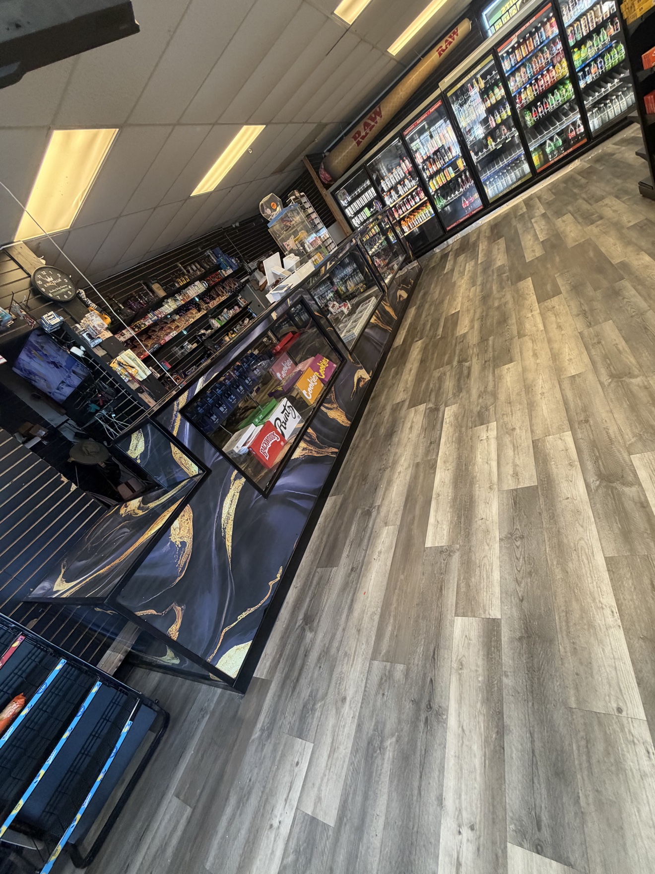 Commercial store remodel with new flooring and counters by J&R Service Solutions